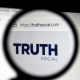Logo of "Truth Social" on a laptop screen.