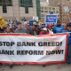 Unions, religious groups and community organizations in Chicago rally outside the conference of the American Bankers Association.