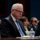 Tim Walz listens during a hearing with the House Oversight and Accountability Committee at the U.S. Capitol.