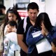People wait in line before their hearings at the New York Federal Plaza Immigration Court in New York City.