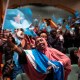 Members of the Somali community await the arrival of the president of Somalia at the Minneapolis Convention Center in Minneapolis.
