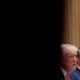 Donald Trump and Pete Hegseth sit in a Cabinet meeting