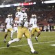 Aneyas Williams of the Notre Dame Fighting Irish runs the ball for a touchdown against the Stanford Cardinal.