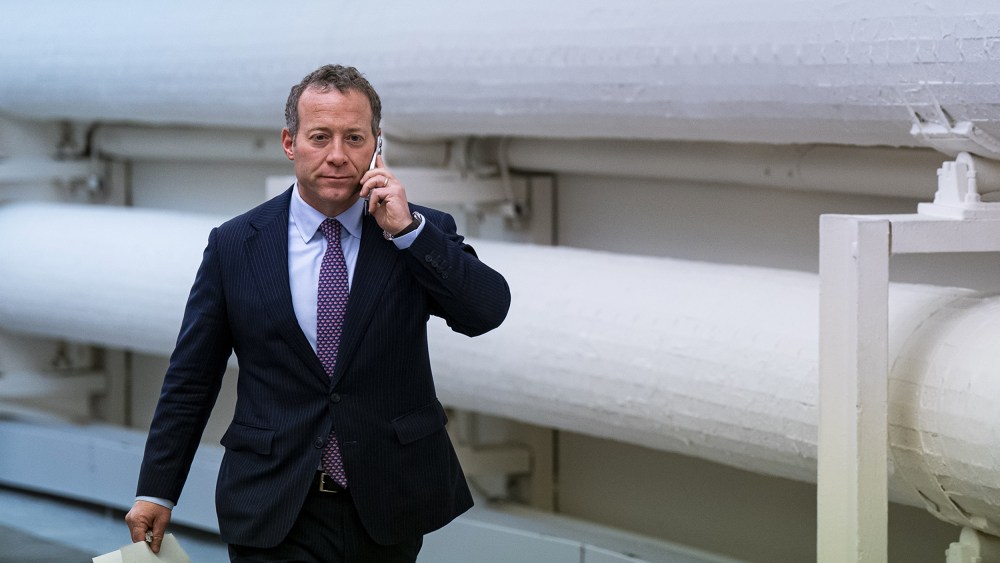 Representative Josh Gottheimer talks on his phone before a meeting on Capitol Hill in on Dec. 6, 2022.