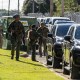 Officers with the Shelby County Sheriff's Office assist the motorcade of US Attorney General Pam Bondi, Secretary of War Pete Hegseth and White House Deputy Chief of Staff Stephen Miller in Memphis, T.N.