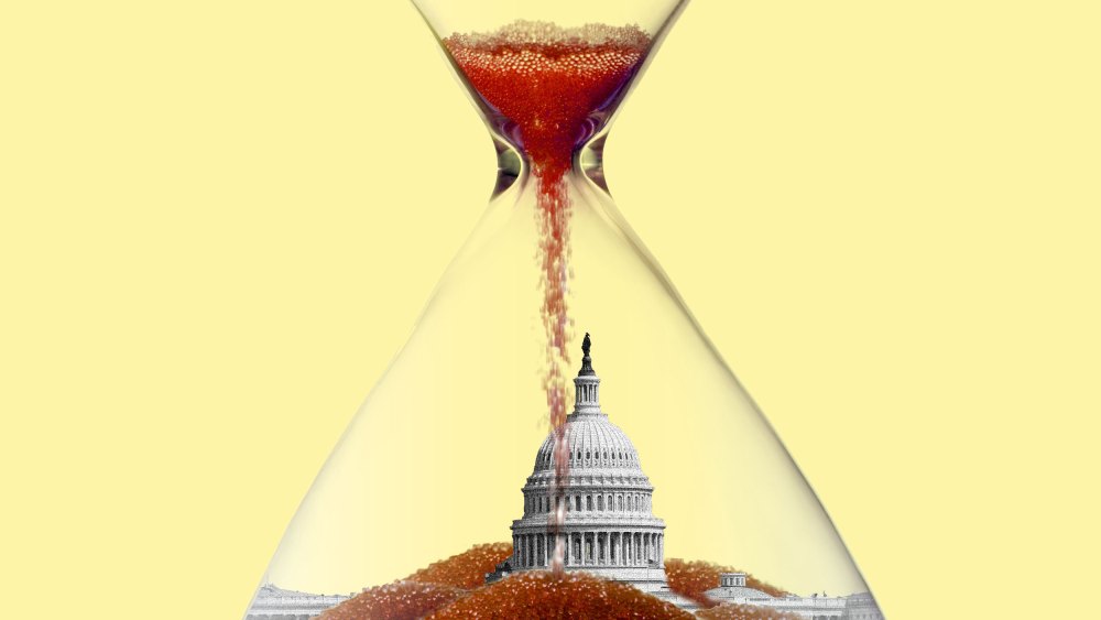 a photo illustration of the US capitol at the bottom of a nearly expired hourglass