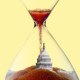 a photo illustration of the US capitol at the bottom of a nearly expired hourglass