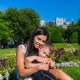 Bruna Ferreira and hugging her young son in a park