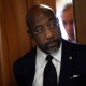 U.S. Sen. Raphael Warnock leaves a Senate Democratic meeting on Oct. 3, 2025 at the U.S. Capitol Building.