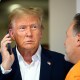Donald Trump talks on the phone.
