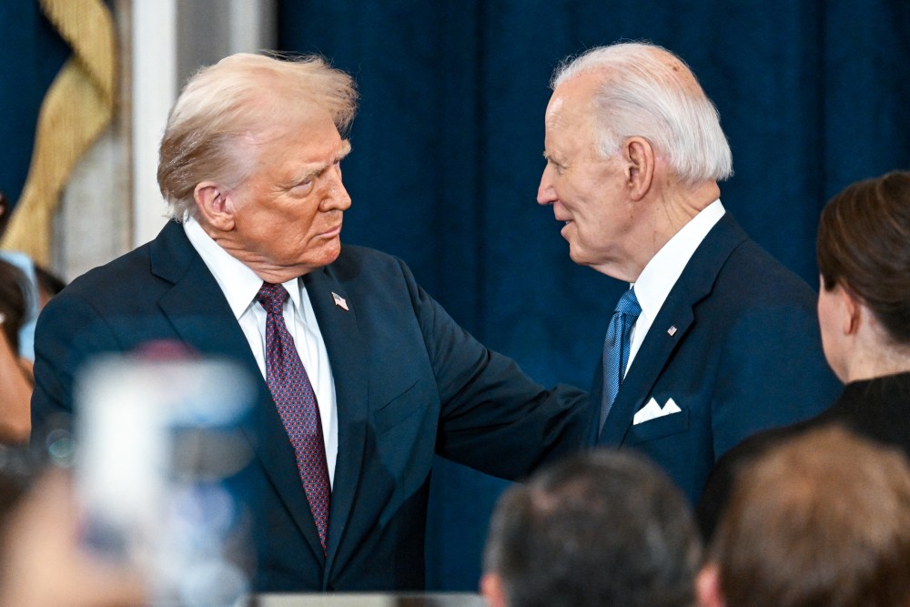 Donald Trump shakes hands with Joe Biden at Trump's inauguration on Jan. 20, 2025 in the U.S. Capitol Rotunda.
