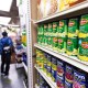 Canned food and other products in an aisle at a grocery store in NY