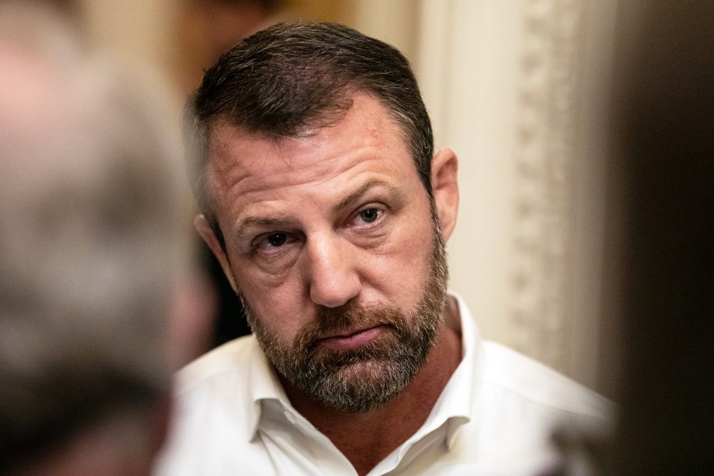 Sen. Markwayne Mullin speaks to reporters on Capitol Hill.