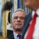 U.S. Secretary of Health and Human Services Robert F. Kennedy Jr. listens to President Donald Trump.