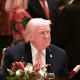US President Donald Trump attends a Christmas dinner on Dec. 24 at his Mar-a-Lago resort in Palm Beach, FL.