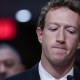 Meta CEO Mark Zuckerberg looks down as he testifies before the Senate Judiciary Committee.