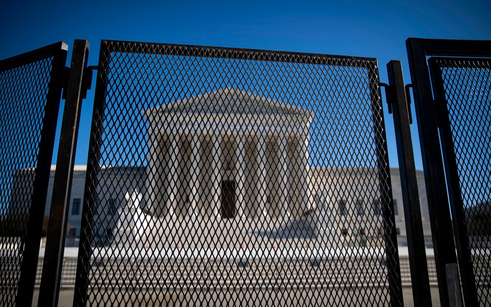 Protective fencing is erected around the U.S. Supreme Court on Jan. 10, 2021.