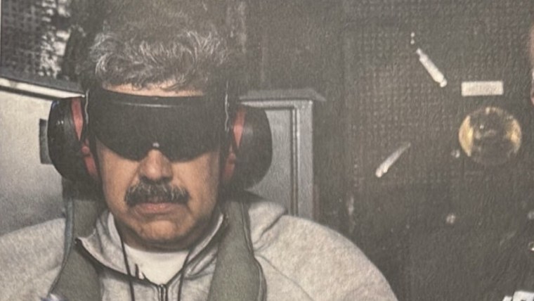 A person blindfolded.