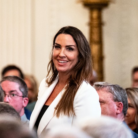 Sara Carter during a bill-signing ceremony on July 16, 2025, in the East Room of the White House.