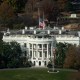 A photo of the white house front face shot from above.
