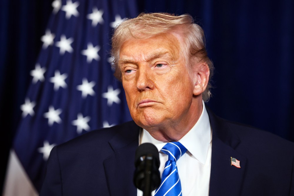 President Donald Trump listens during a press conference on Dec. 28, 2025 at his Mar-a-Lago club in Palm Beach, Fla.
