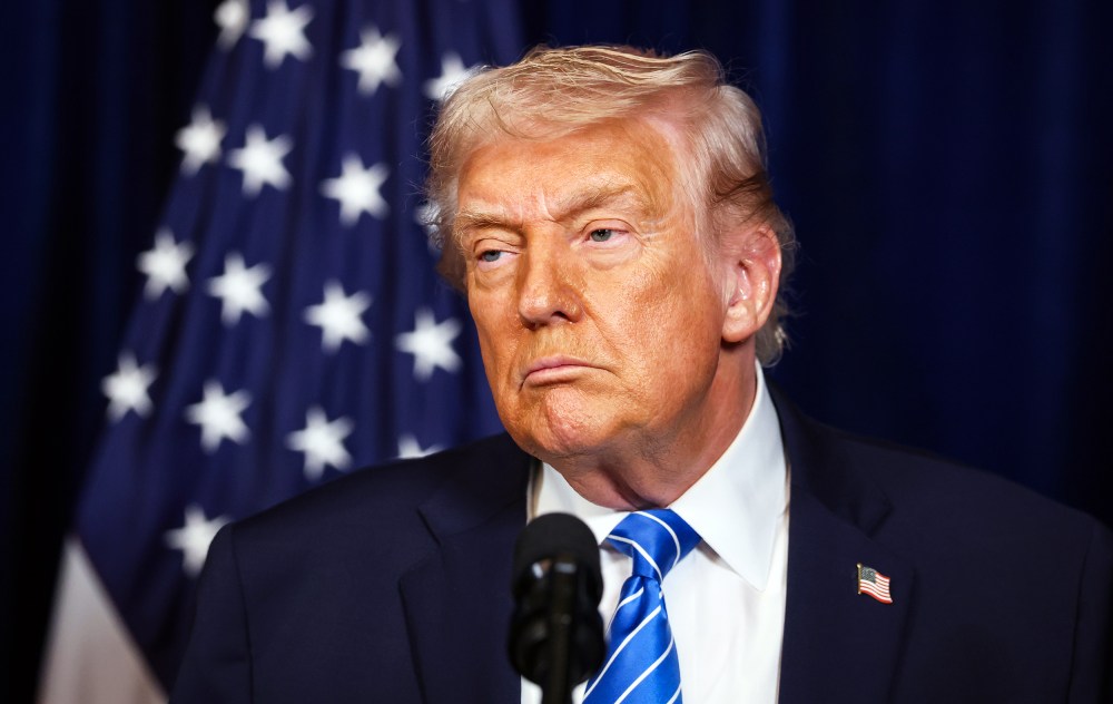 President Donald Trump listens during a press conference on Dec. 28, 2025 at his Mar-a-Lago club in Palm Beach, Fla.
