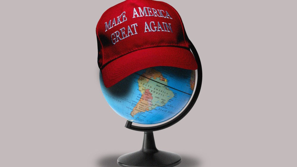An illustration of a MAGA hat on top of a globe
