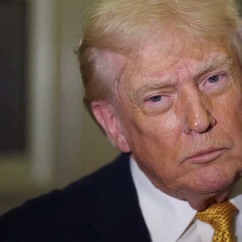 President Donald Trump wearing a gold tie.