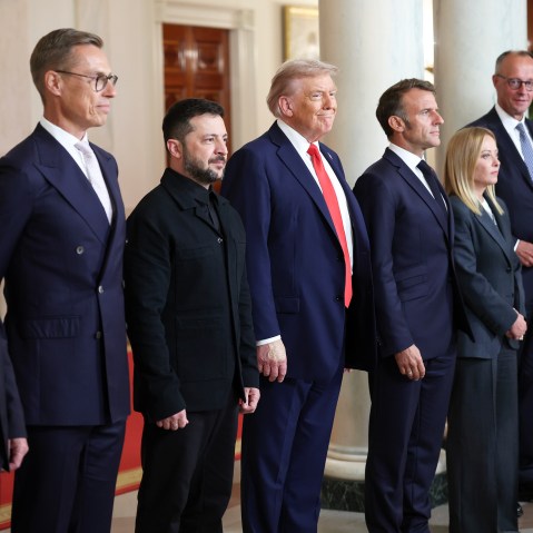 U.S. President Donald Trump and Ukrainian President Volodymyr Zelensky pose for a picture with European leaders following a meeting on August 18, 2025 in the Oval Office at the White House.