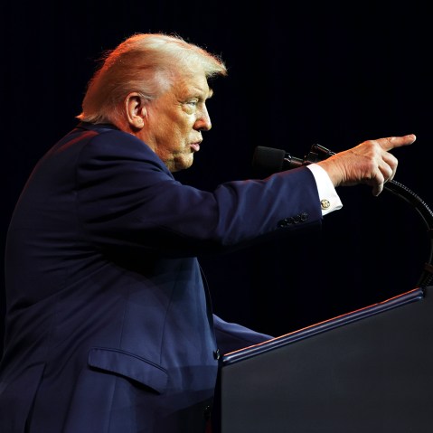 President Donald Trump addresses a House Republican retreat.