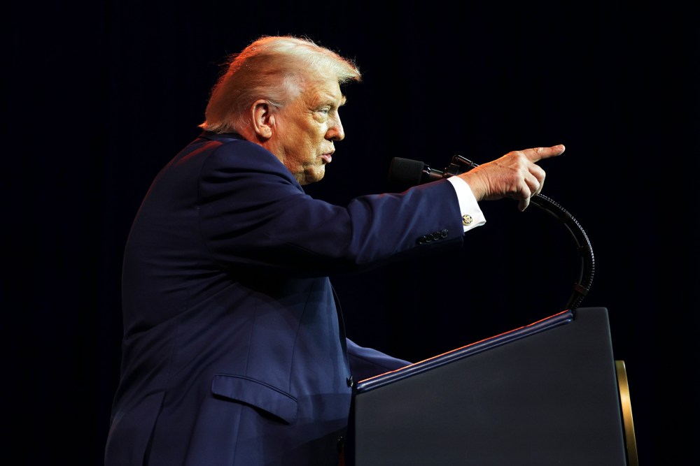 President Donald Trump addresses a House Republican retreat.
