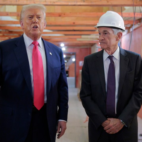 President Donald Trump, left, tours the Federal Reserve&rsquo;s headquarters.