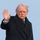 President Donald Trump waves as he boards Air Force One.