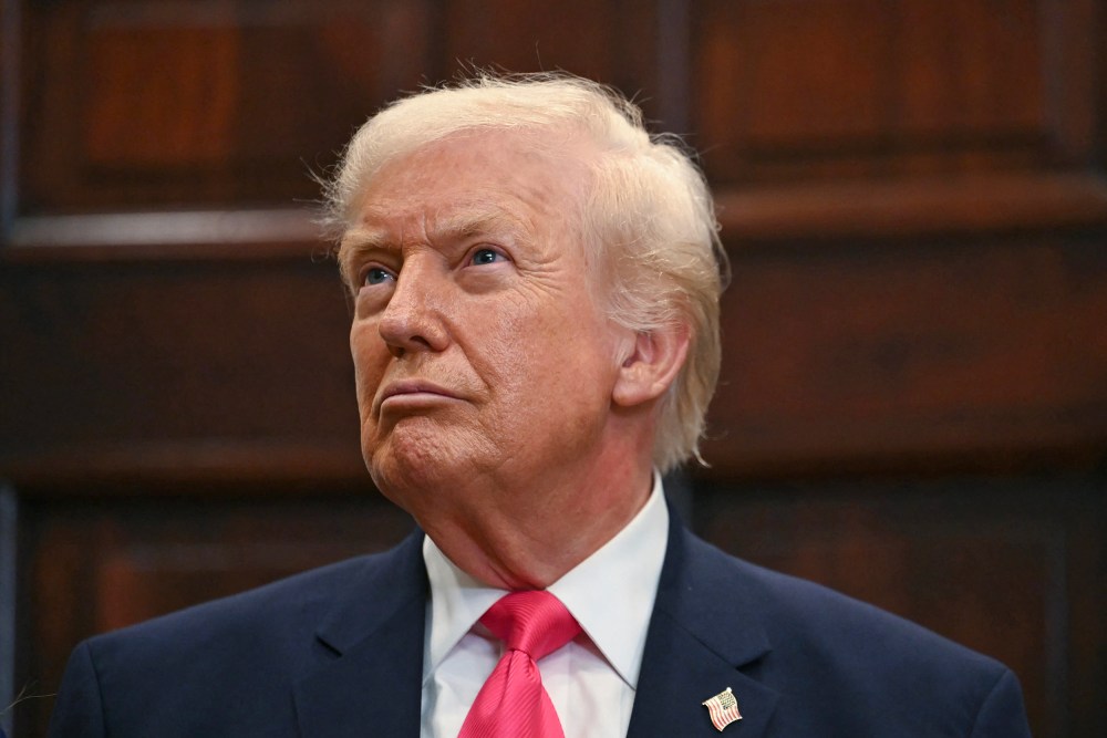 President Donald Trump looking up.