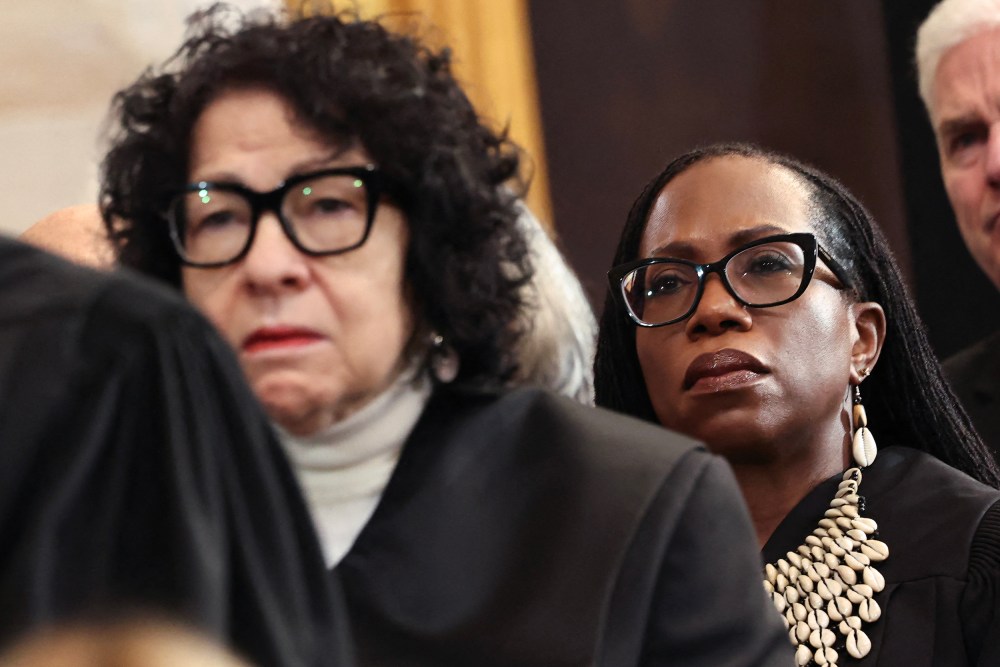 Supreme Court Justices Sotomayor and Jackson stand behind Chief Jutice Roberts during President Trump's inauguration for his second term in the office.