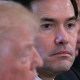A closeup of Marco Rubio’s face during a meeting in the White House. To his left, Donald Trump can be seen out of focus.