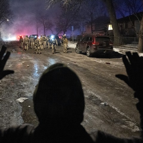 Federal law enforcement officers during confrontations with residents in Minneapolis.