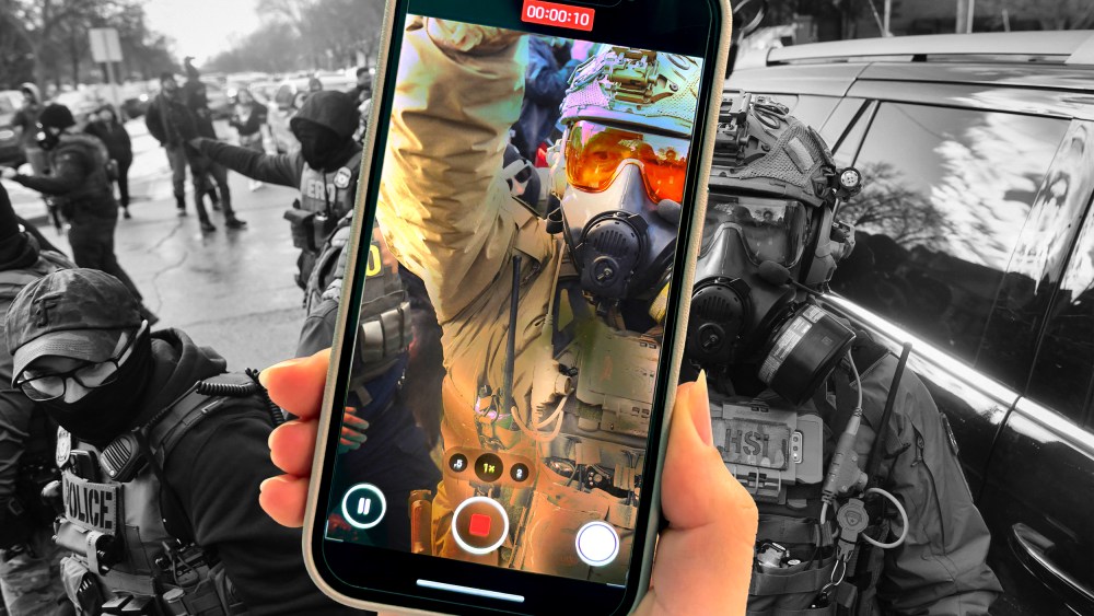 A photo illustration of a person holding an iPhone while filming an ICE agent