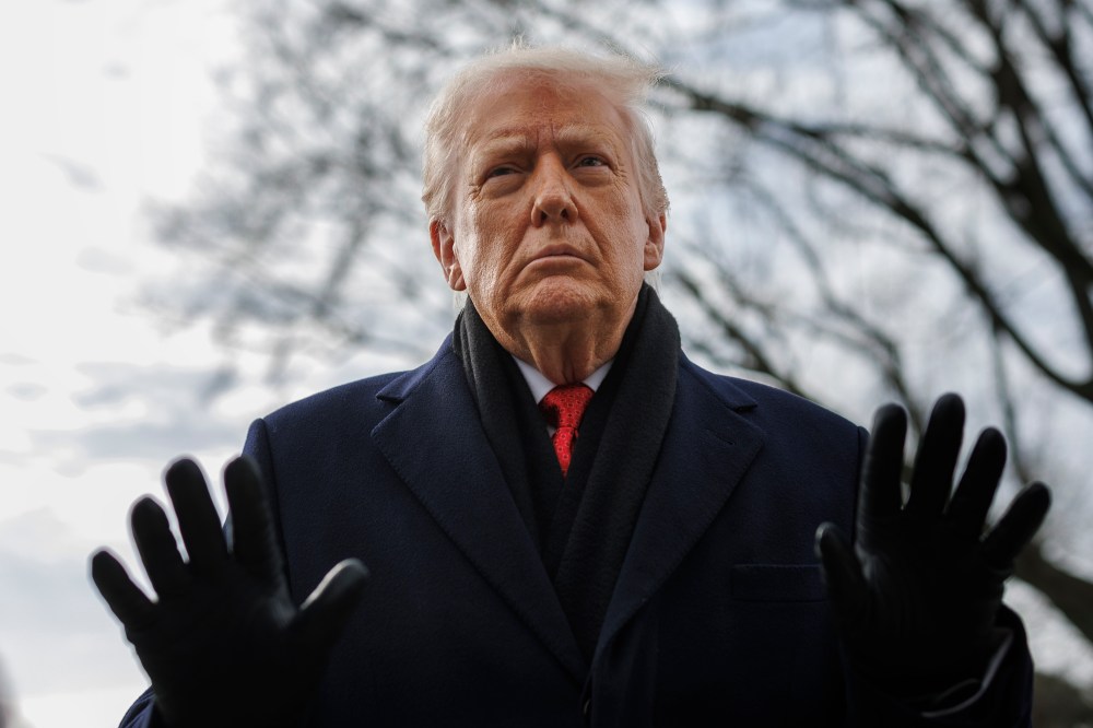 President Donald Trump speaks to reporters on the South Lawn