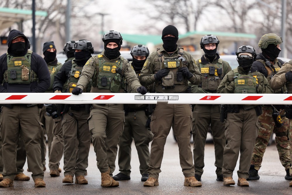 US Border Patrol agents stand guard on Jan. 8, 2026 in Minneapolis.