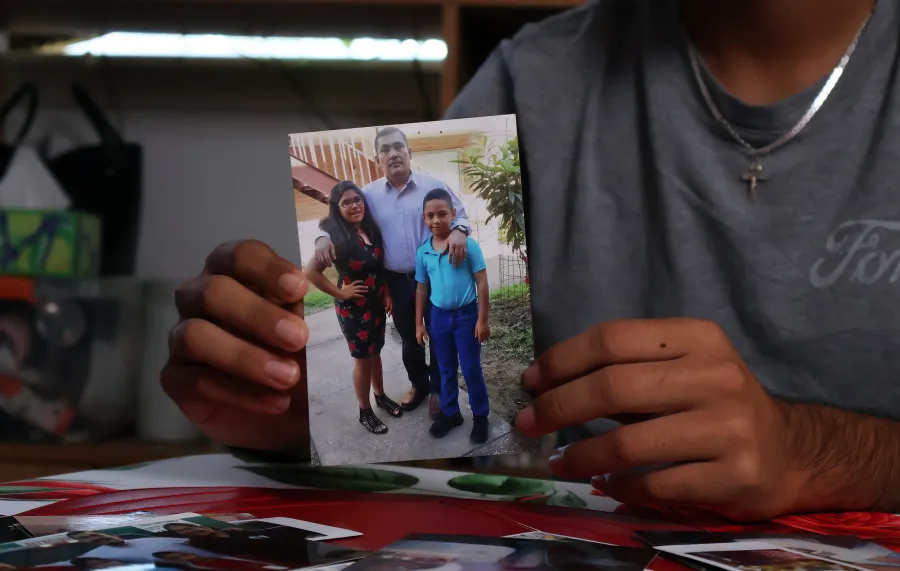 Arnoldo carried this photograph of himself, his father, and one of his sisters, Selena, with him to the hospital.