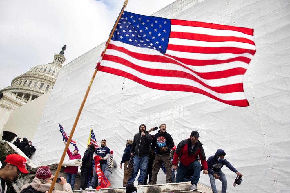 Trump supporters clash with police and security forces as people try to storm the US Capitol on Jan. 6, 2021.